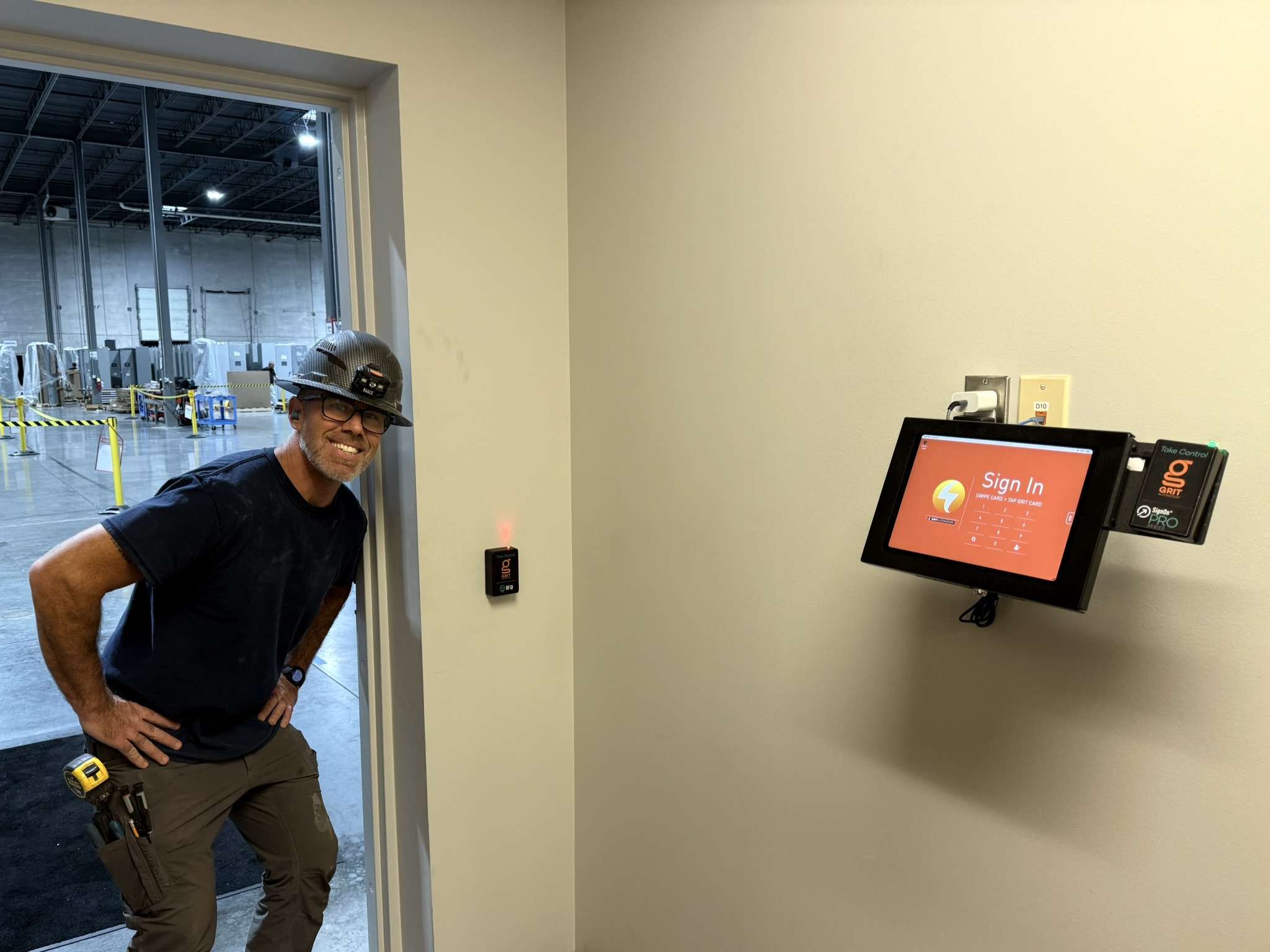GRIT Track SignOn and RFiD readers installed beside a manufacturing-floor entrance